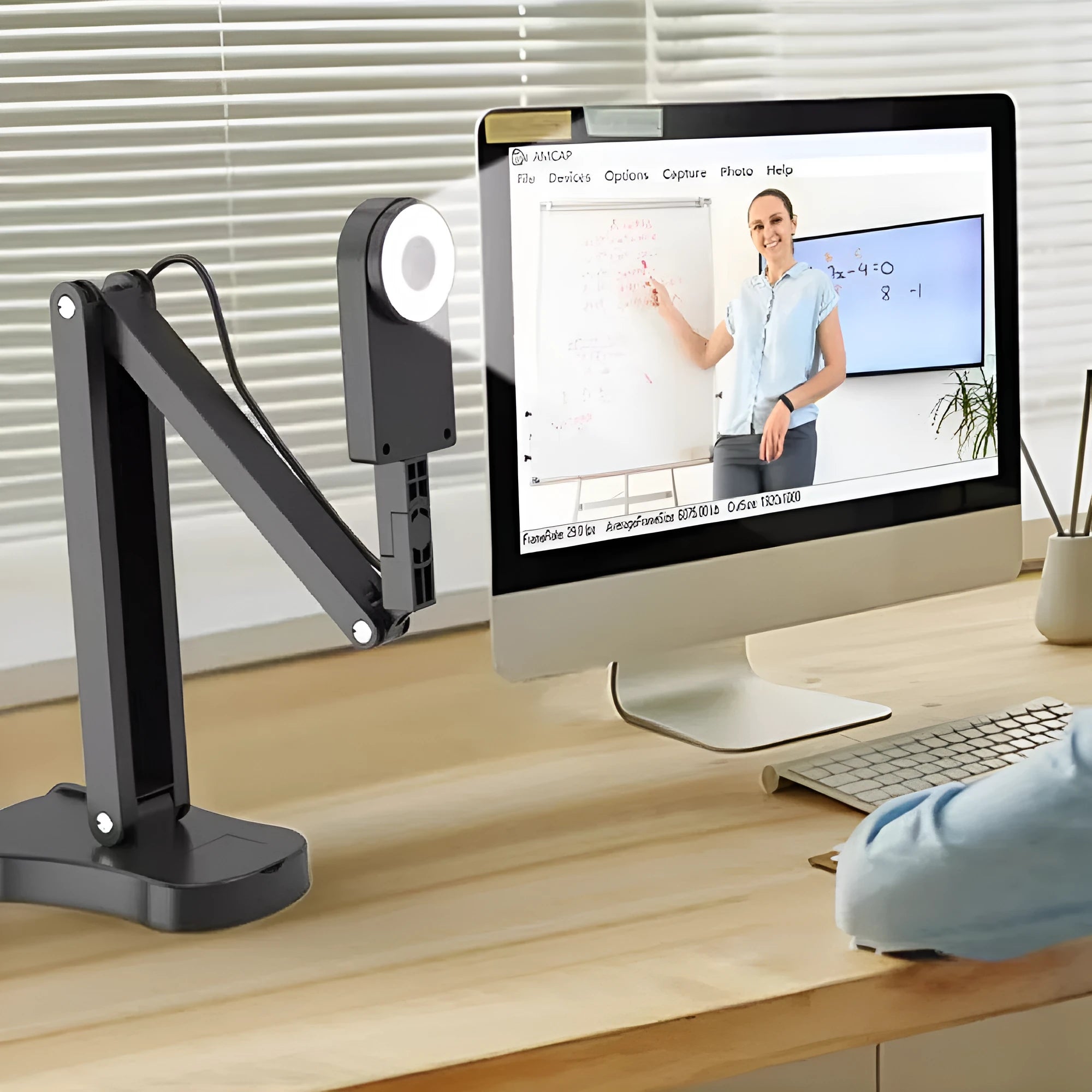 USB auto-focus webcam with microphone for computer video calls and photography.
