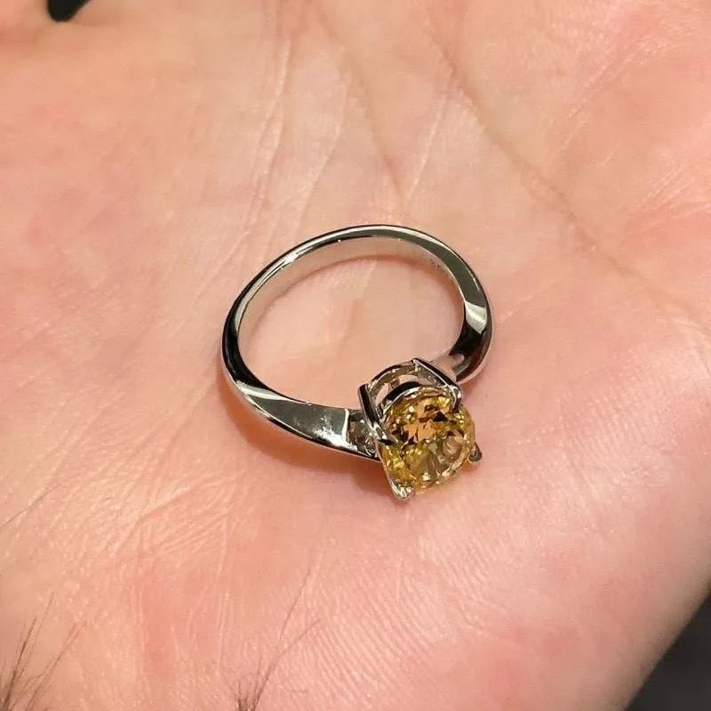 Women's yellow rock sugar crystal ring in copper with Seiko treatment showing band and distinctive colour design