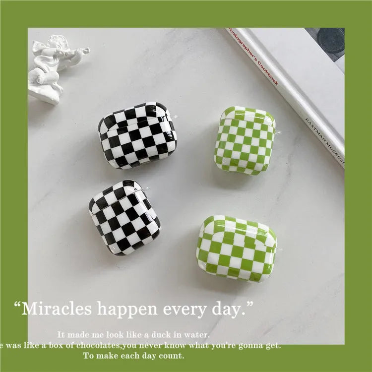 Black and green checkerboard pattern TPU protective sleeve for AirPods case with optional lanyard.