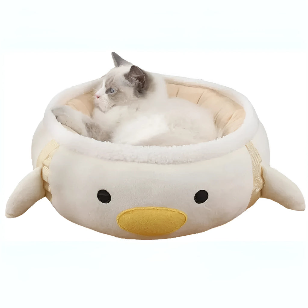 Green chick-shaped cat bed shown both flat and hanging as a hammock for a small cat