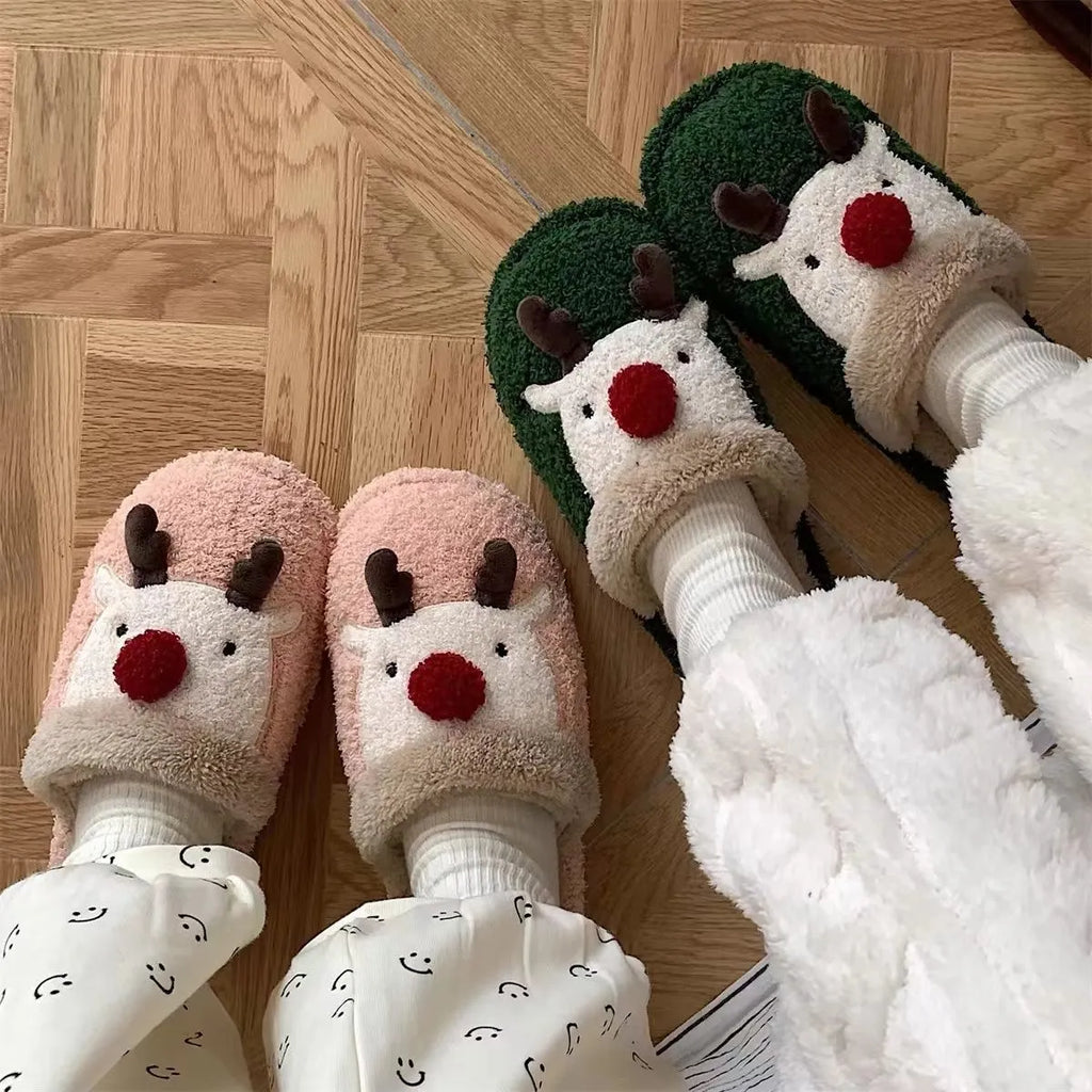 Women's green Christmas deer cotton plush slippers with non-slip PVC soles.