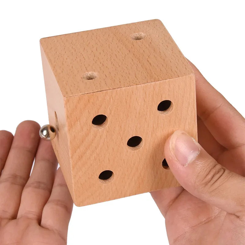 Dice maze wooden educational toy, 8.2cm cube ball labyrinth on white background
