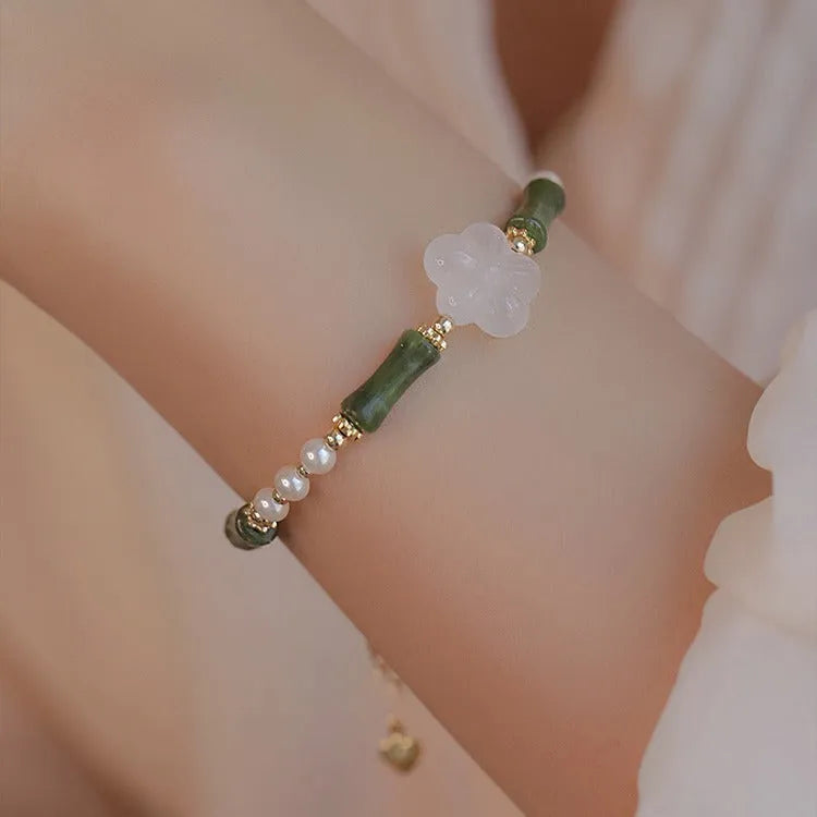 Chinese style olivine bamboo joint shell pearls bracelet with Hetian jade and copper detailing