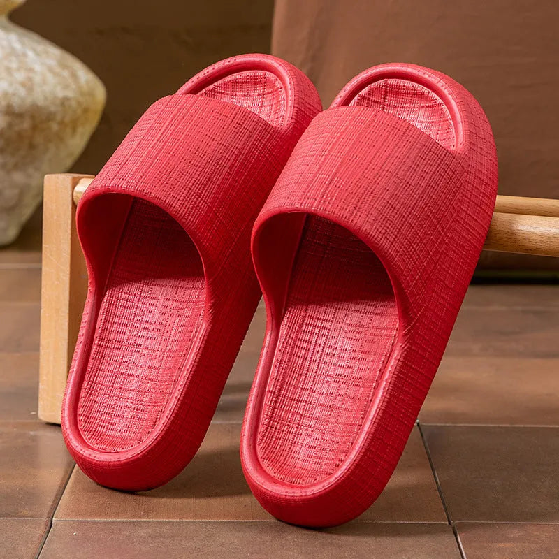 A pair of EVA toe ring slippers in a chosen colour, showing the soft non-slip sole and strap design.