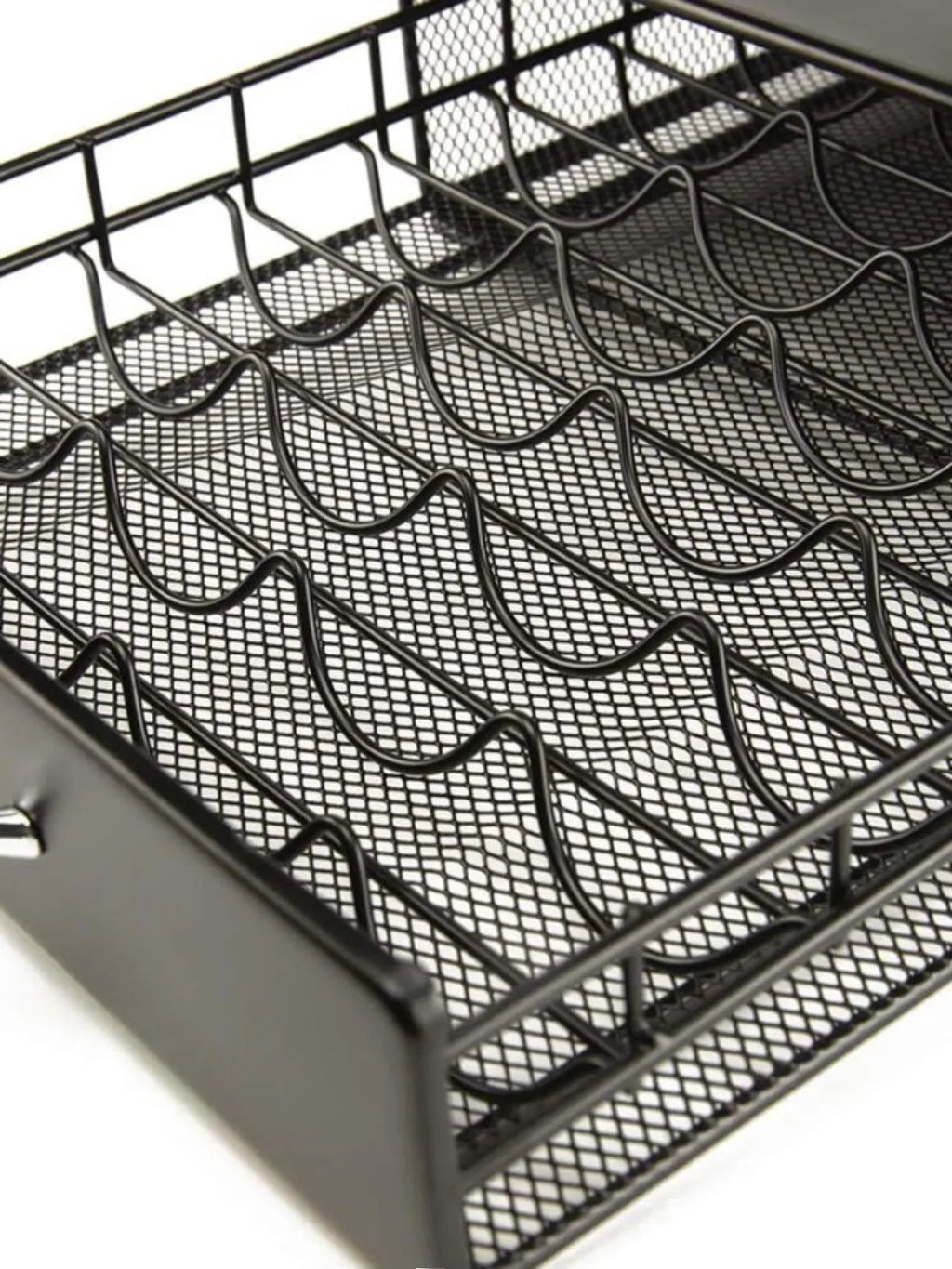 Black coffee capsule storage drawer with silver handle, 40x29x8.5cm, on a cafe countertop