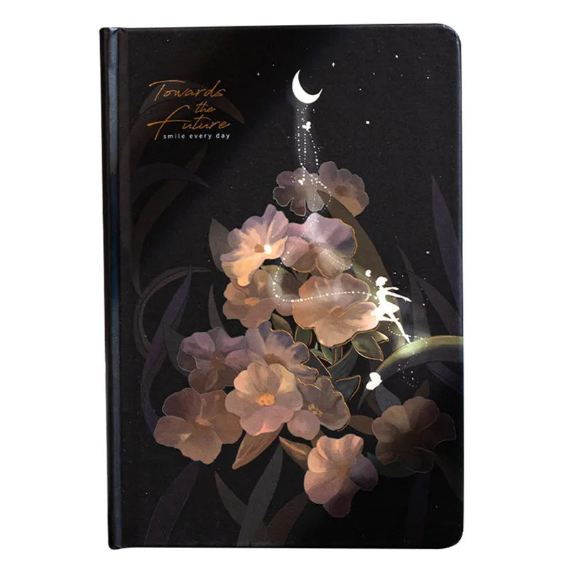 A5 diary book with a luminous purple cover, open to show pages with colour illustrations.