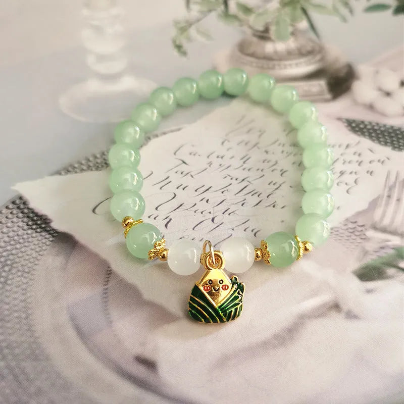 Chinese style glass bracelet with bamboo joint design elements in multiple colour options