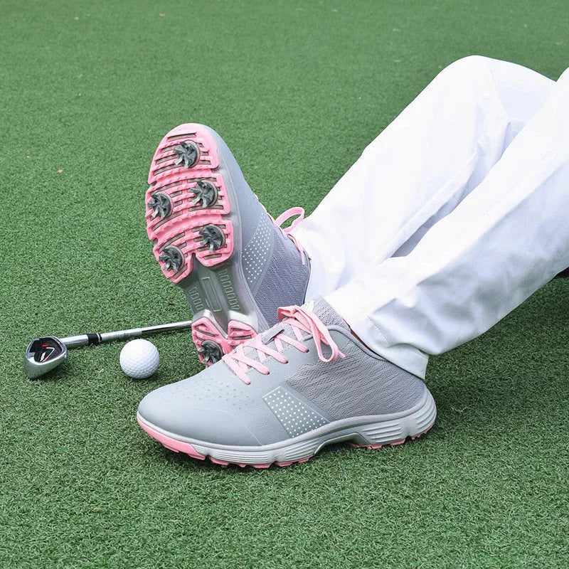 Women's waterproof golf sneakers with white or pink microfiber upper and natural rubber outsole