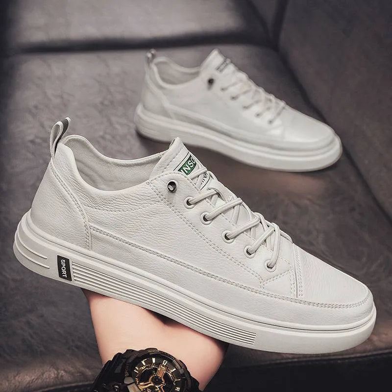 Men's beige casual flat shoes with round toe and low heel on a white background.