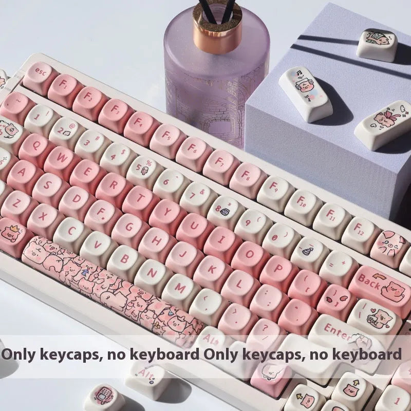 Close-up of a pink, pig-shaped PBT keycap with a detailed sublimation print on a keyboard.