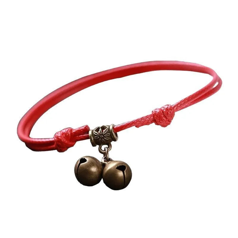 Nylon rope dog collar with brass bell and buckle in black, red, or coffee colour on a size chart.