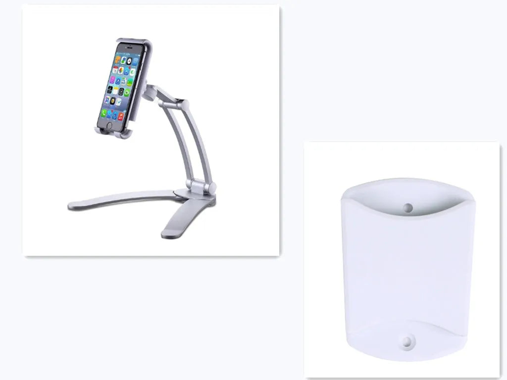 Silver aluminium alloy desktop tablet stand with adjustable clips and 360-degree rotation on a white mount.