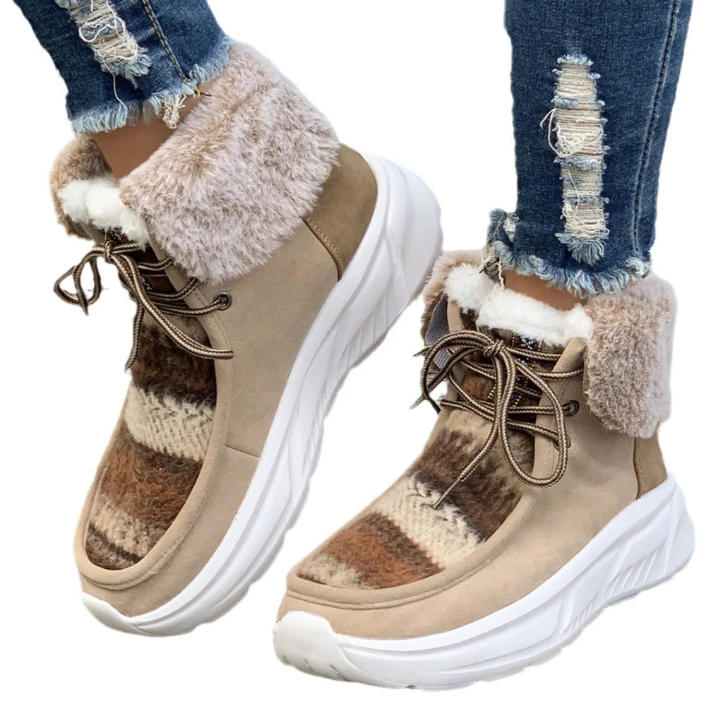 Beige women's lace-up mid-top snow boots with a fuzzy lining and thick platform sole.