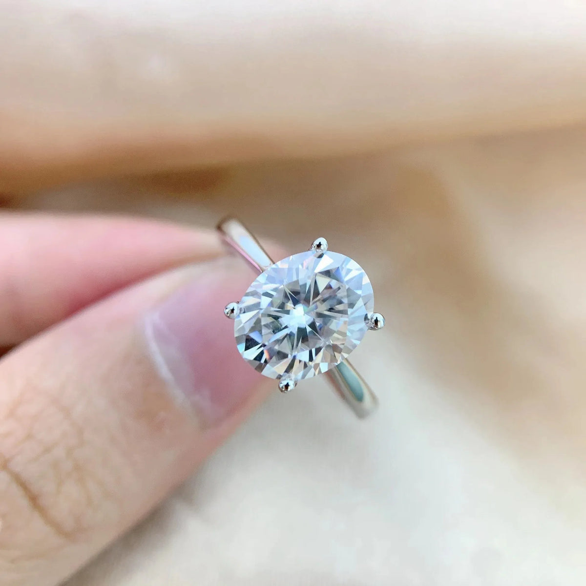 Oval moissanite ring in four-claw setting, D colour, electroplated band, sizes 5 to 9
