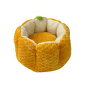 Orange pumpkin-shaped enclosed pet bed for cats or small dogs with cotton filling.