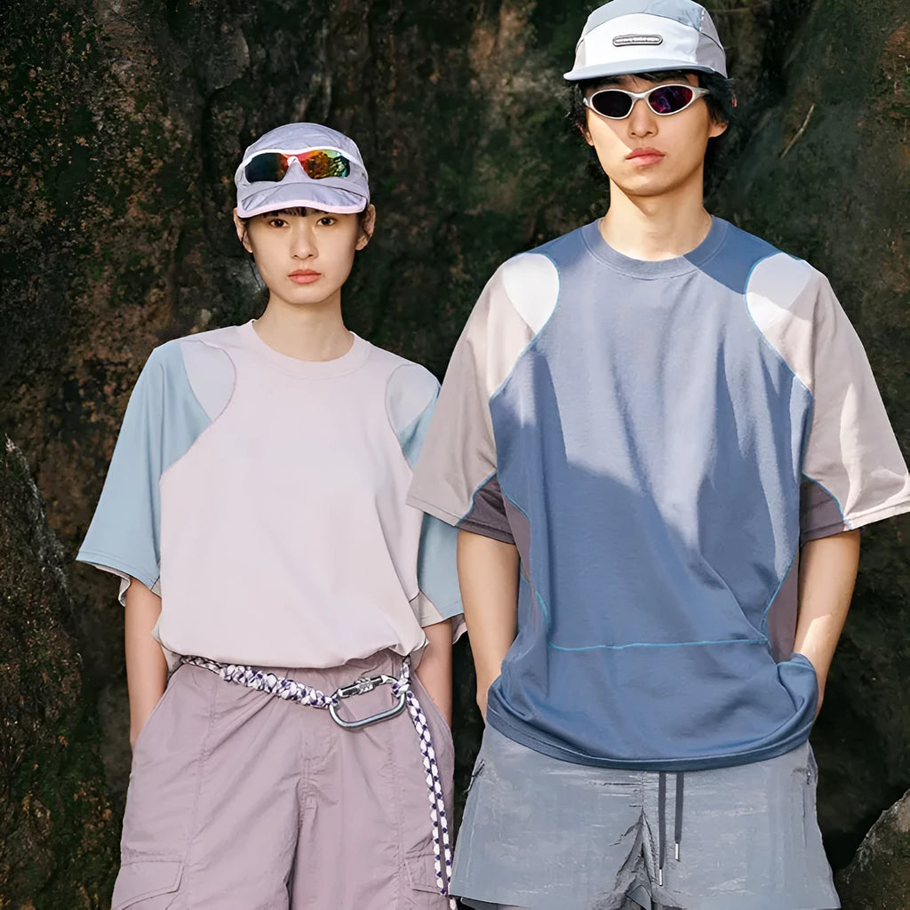 Men's loose fit patchwork t-shirt in blue or beige with short raglan sleeves.