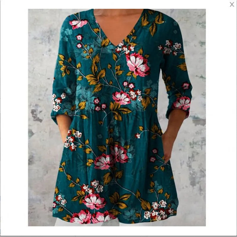 Women's printed loose dress with wide waist and 3/4 ruffle sleeves in a floral wave pattern.
