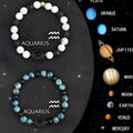 Set of twelve natural stone beaded bracelets for zodiac signs on elasticated string.
