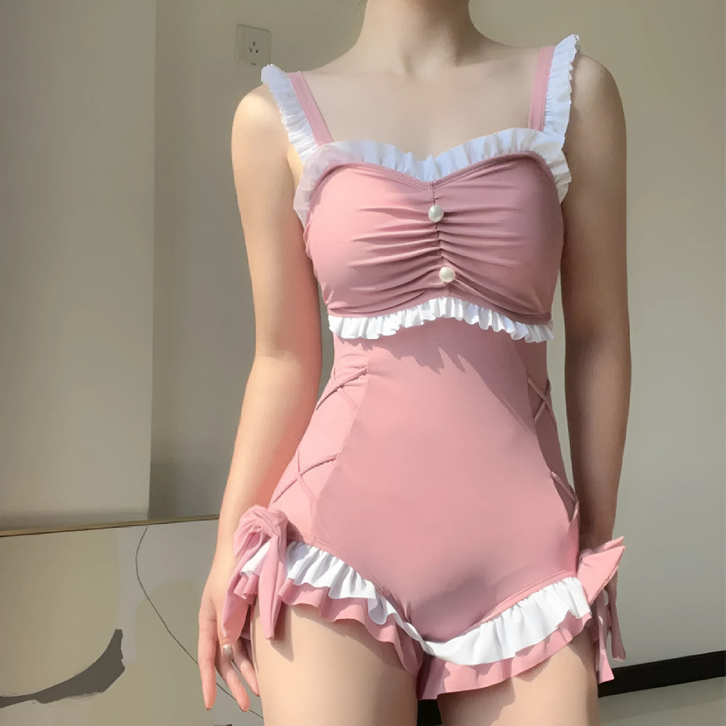 Women's solid colour one-piece swimsuit in milk silk fabric, shown in pink.