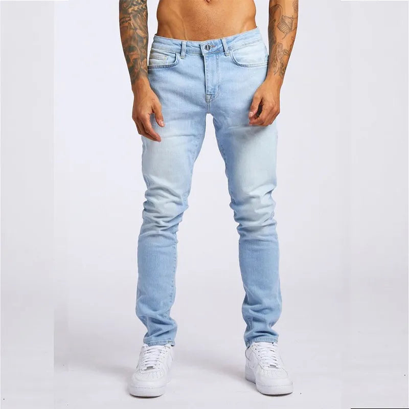 Men's slim fit high waist cotton jeans in light blue or black, sizes 28 to 36