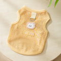 Cat wearing hollowed-out breathable clothes with bear patch in knitted fabric
