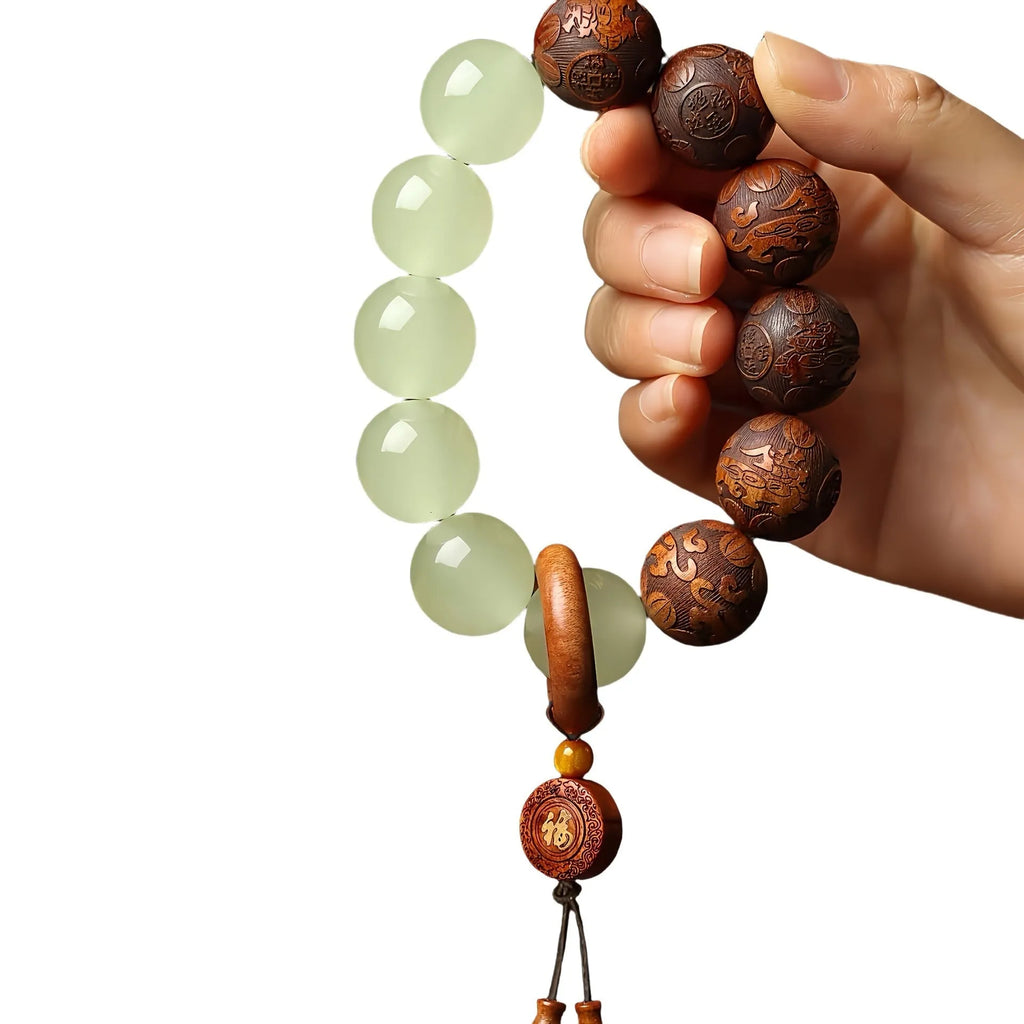 Wooden bracelet with carved Amass Fortunes character on rosewood segments