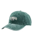 Retro personalised washed distressed peaked cap with adjustable strap and embroidered letters on the front.