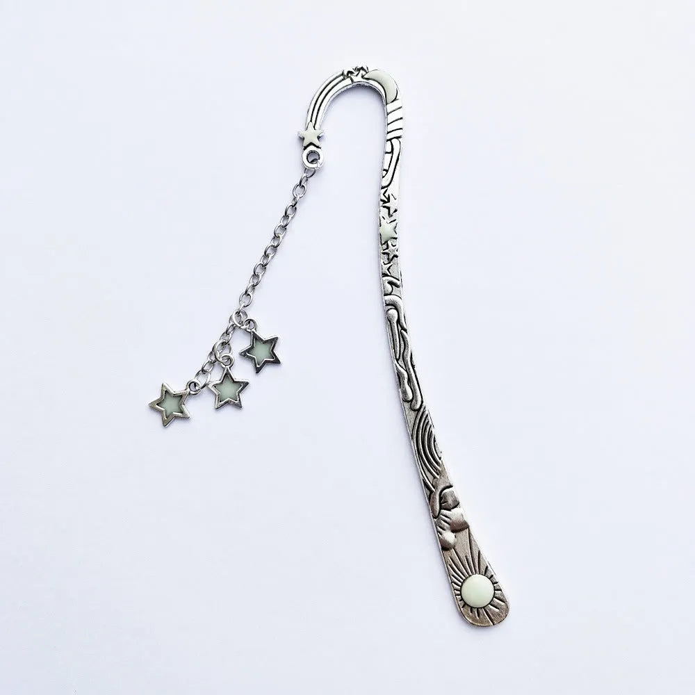 Retro five-pointed star glowing metal bookmark with celestial sun moon star design and fluorescent finish