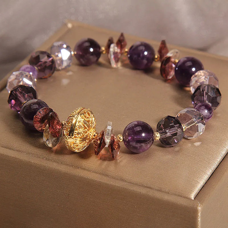 Purple crystal pumpkin bead bracelet with wind chime charms and rhinestone accents for women