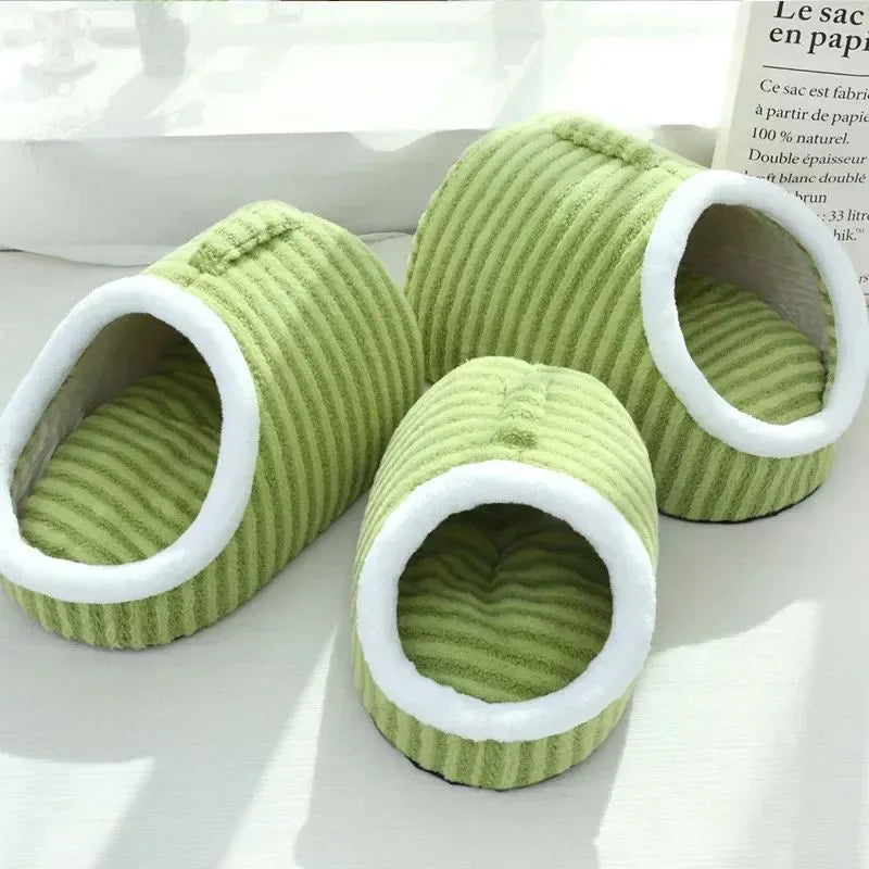 Striped thickened 3D dog bed with enclosed hole design and removable sponge mattress in blue, green, pink, or yellow.