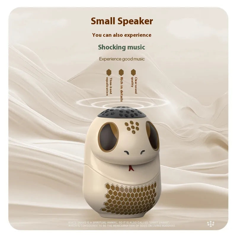 TK900 white cartoon-themed portable Bluetooth speaker with card insertion slot and LED lighting
