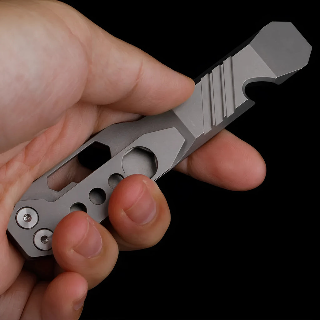 Titanium alloy multi-function crowbar tool with bottle opener and screwdriver, in gun grey finish.