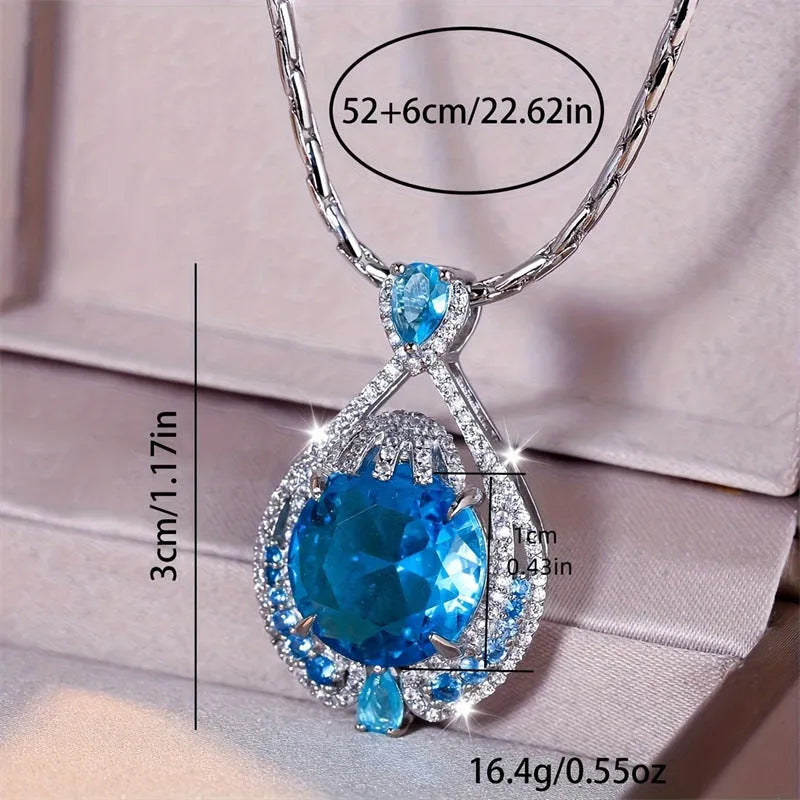 Blue geometric pendant necklace with fireworks cut crystal gemstone and water wave chain
