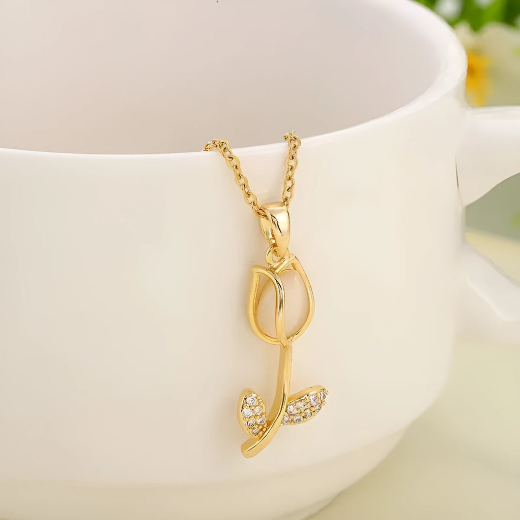 Zircon Tulip necklace with gold floral pendant on an adjustable titanium steel O-ring chain.