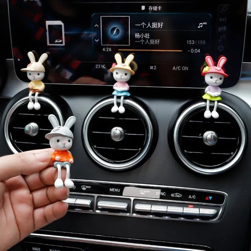 Cartoon rabbit car decoration set with four sitting rabbit figures in plain, pink flower, colourful balloon or travel balloon style