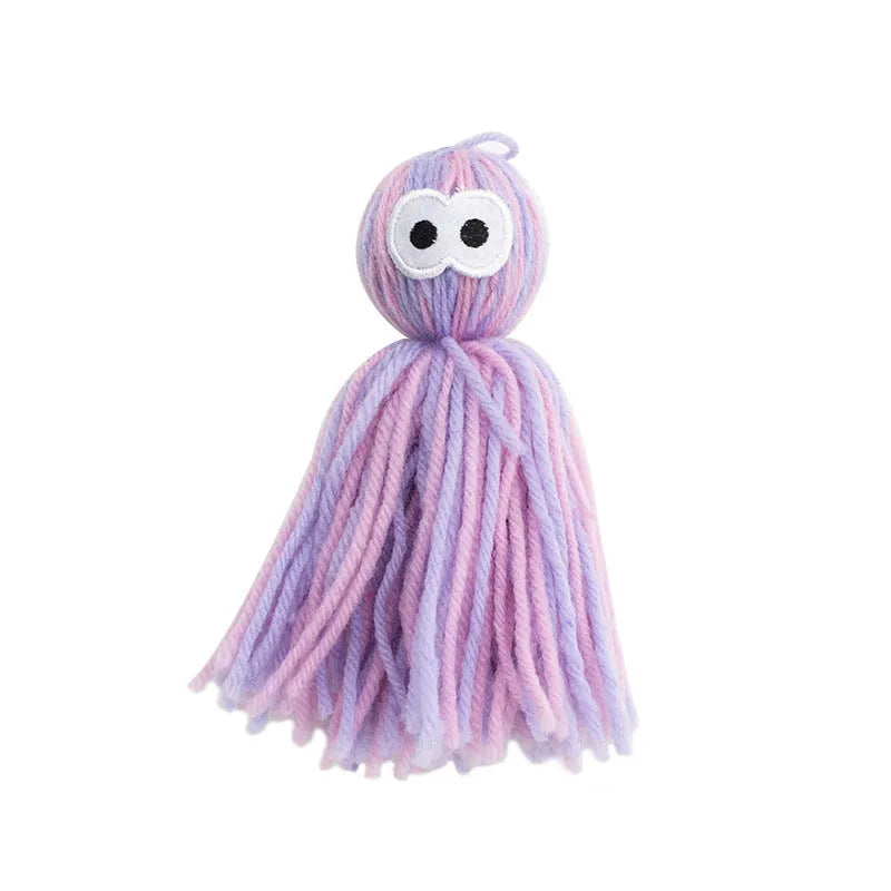 Cat toy set with wool ball, hanging attachment, and teaser stick in blue-gray colour combination