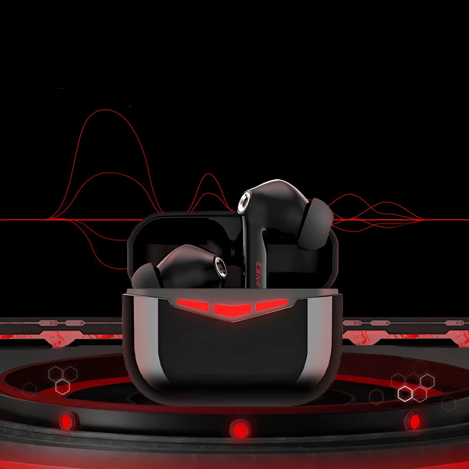 Black true wireless gaming earbuds with charging case and three pairs of silicone ear tips on a grey background.