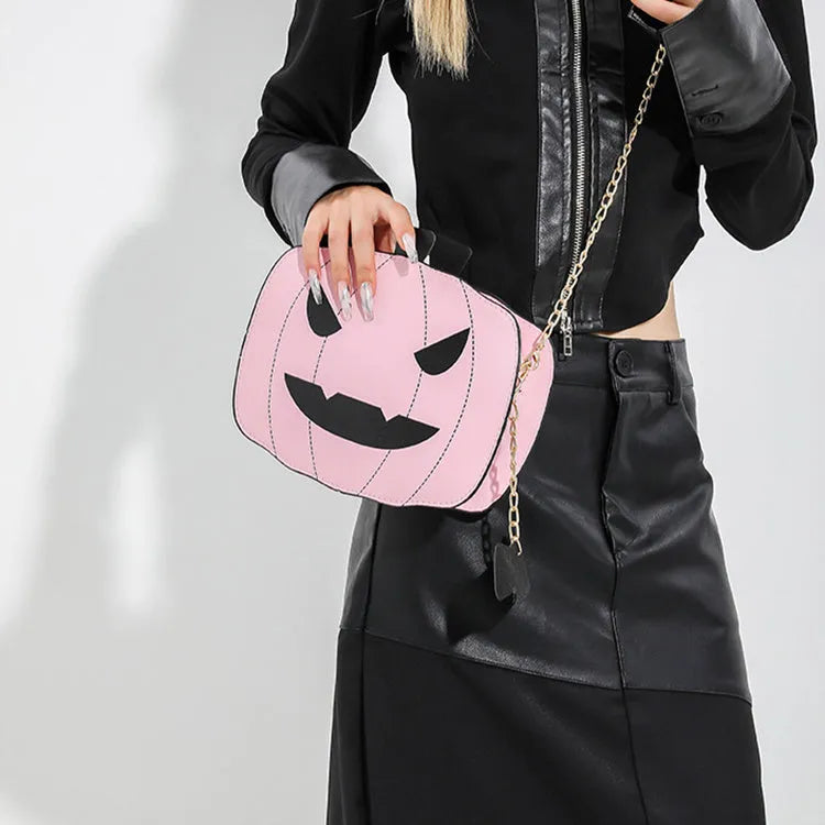 Halloween cartoon pumpkin shoulder bag for girls in colour options with chain crossbody strap on white background