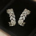 Women's copper earrings in white gold colour with inlaid zircon and wheat leaf design
