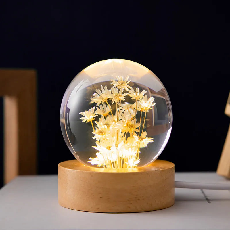 6cm clear resin dandelion crystal ball night light on a beech wood base with USB cable.