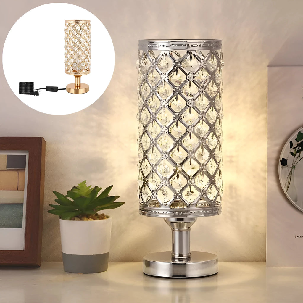 Modern crystal table lamp with hollow-carved design, metal base, gold finish, on bedside table