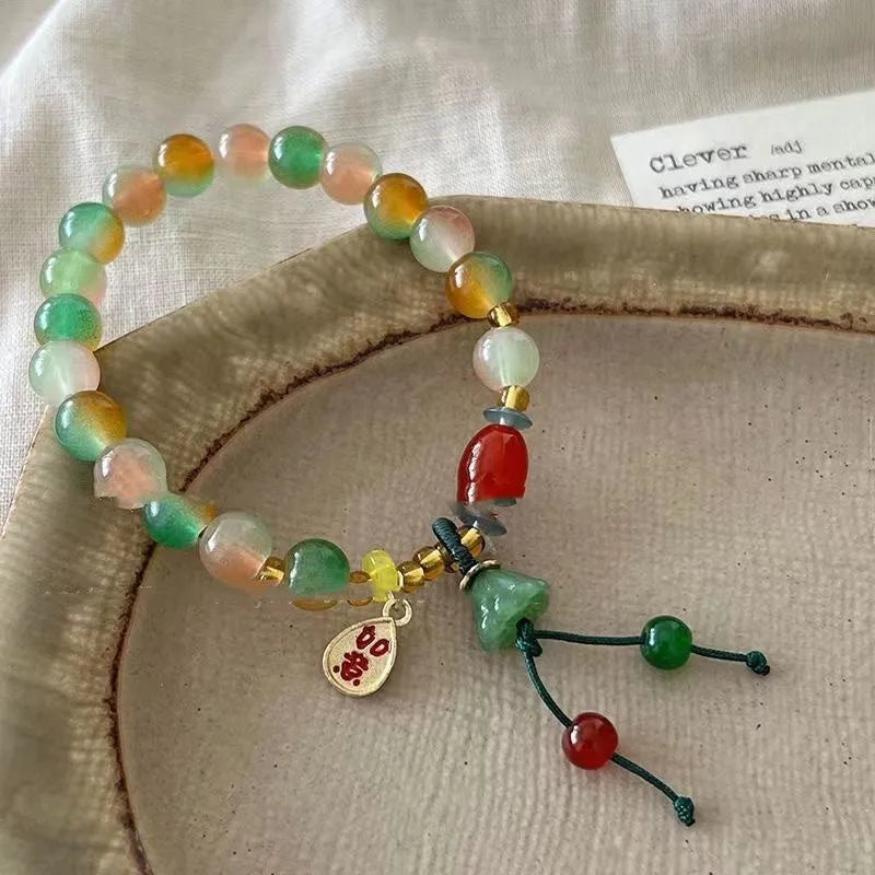 M990 Lotus Ruyi bracelet showing mixed material construction and lotus decorative element