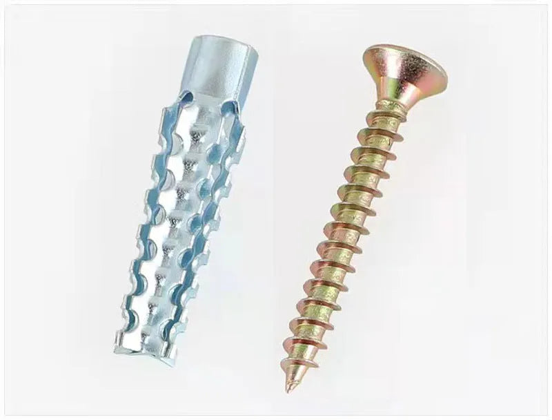 Metal Christmas tree barbed expansion tube screws in various sizes for concrete and brick walls.