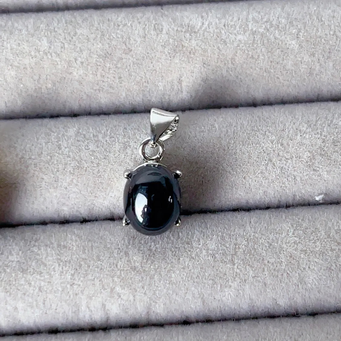 Copper open ring with crystal inlay, geometric shape, black tourmaline colour, on white background