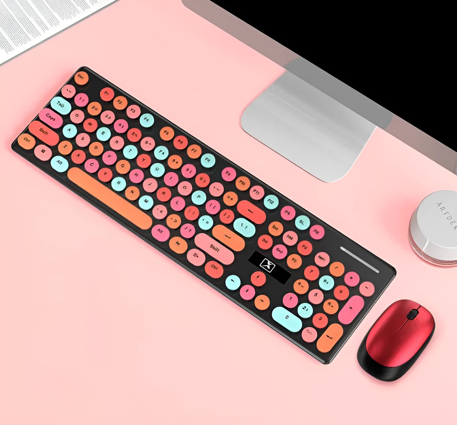 Vibrant yellow wireless keyboard and mouse set with backlit keys on a desk.