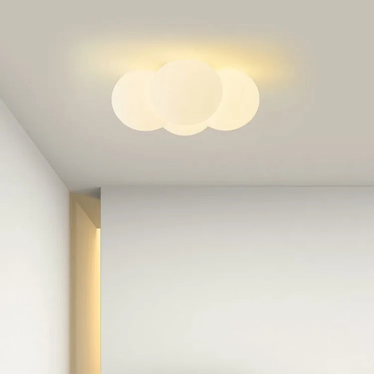 Modern cloud-shaped chandelier with 4 lights and minimalist design for bedroom ceiling mounting