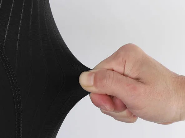 Black shock-absorbing cycling pants with seven-inch inseam and reflective cursor for road mountain biking