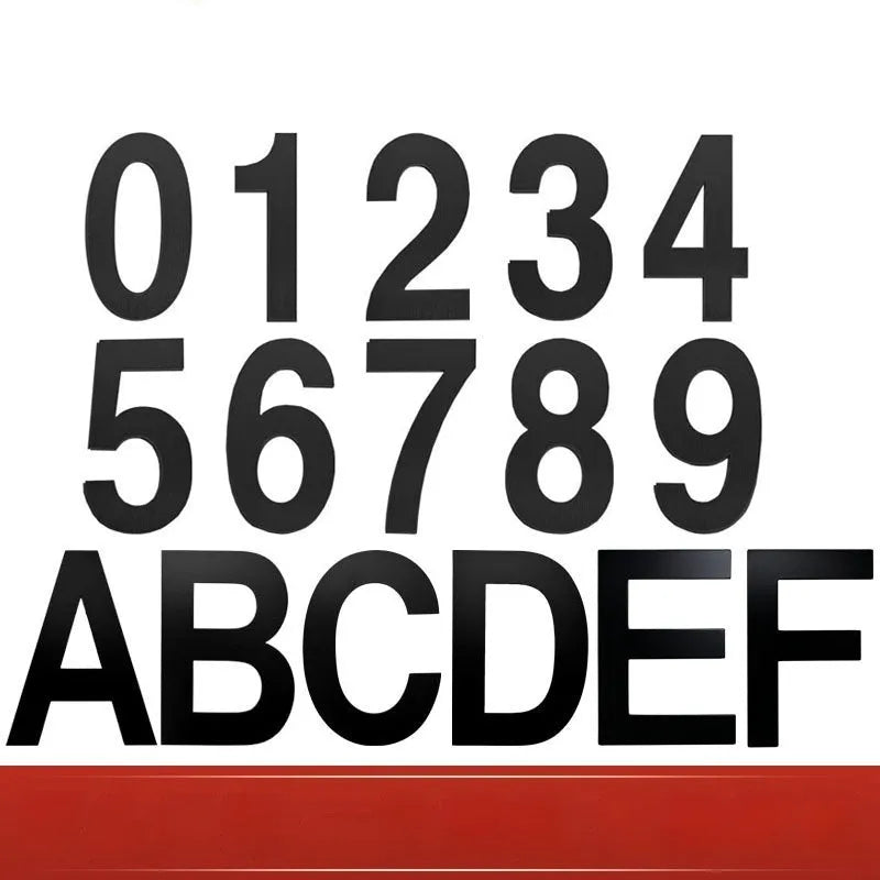 Black stainless steel sticky house number showing the digit 7, 7.5cm in size