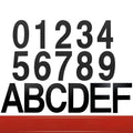 Black stainless steel sticky house number showing the digit 7, 7.5cm in size