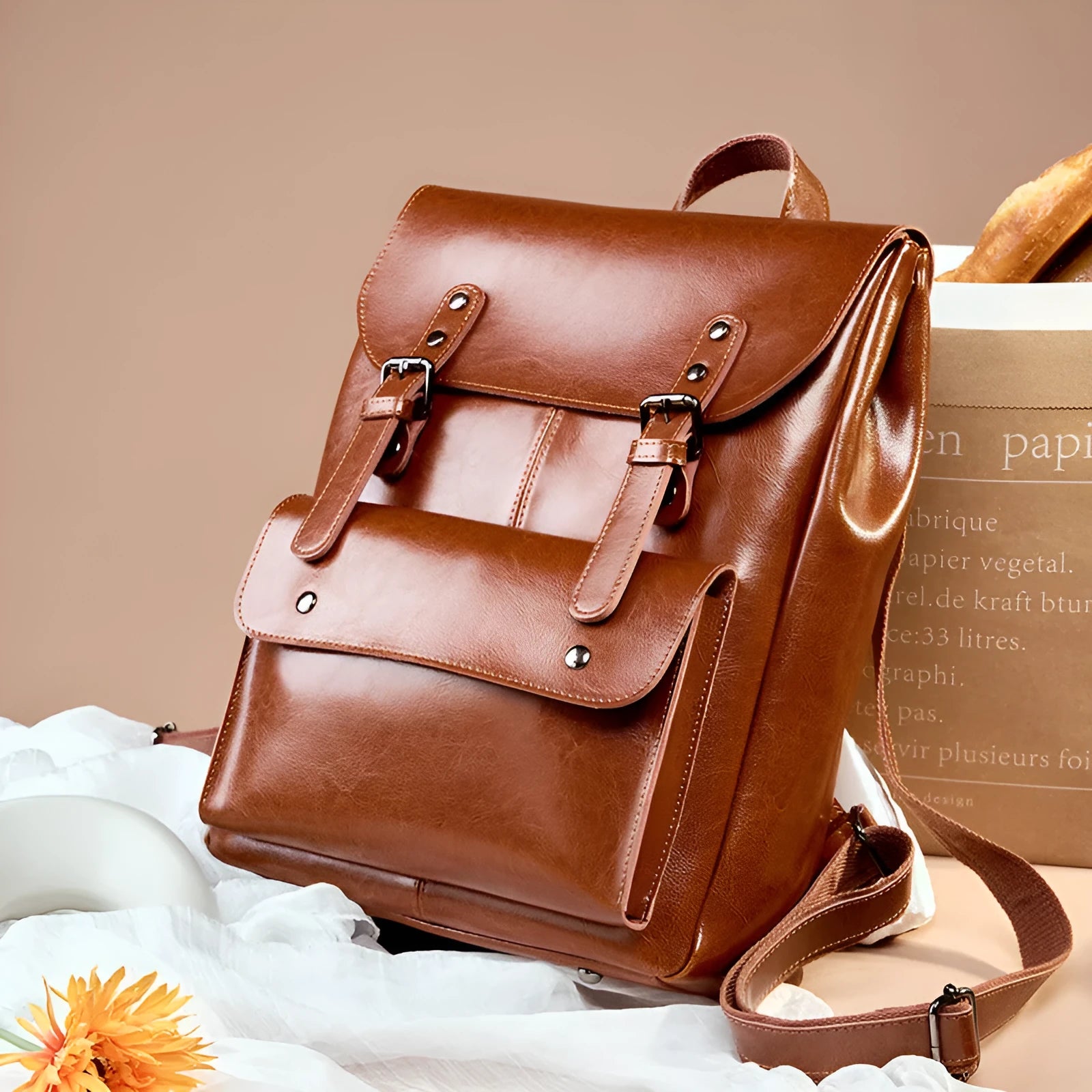 Black cowhide leather laptop backpack for women with a structured, hard-sided design.